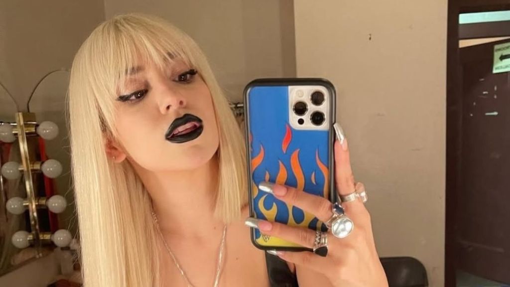 Ava Max Poses in Complete Sheer Dress As She Celebrates Song Milestone