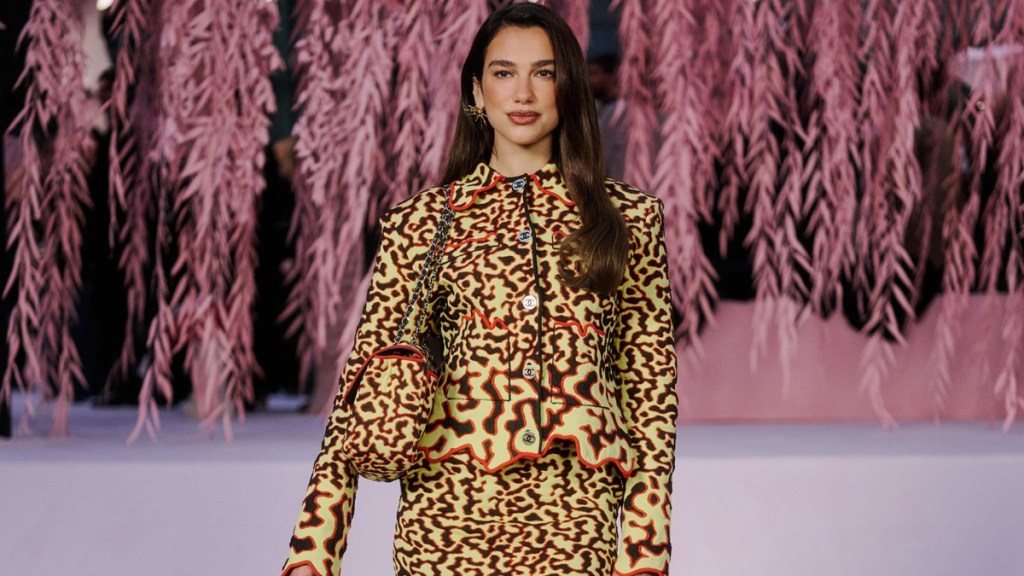 Dua Lipa Steals the Spotlight in Midi Skirt For PFW