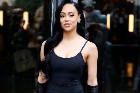 Influencer Kristy Sarah Poses in 'Revenge' Burgundy Dress