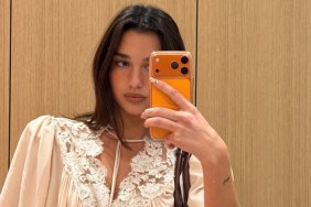 Dua Lipa's Low-Cut Top Exposes Lacey Bra
