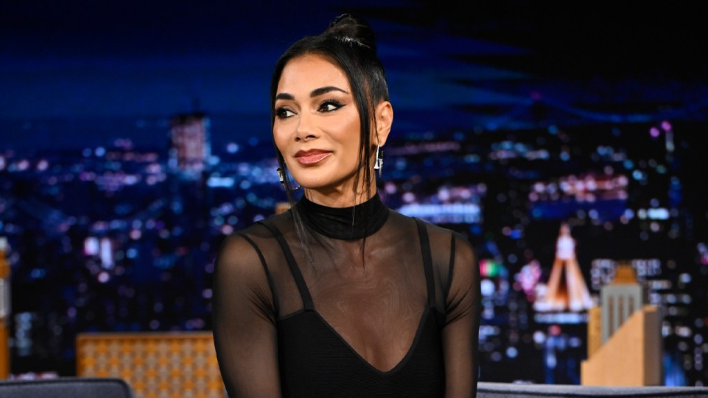 Nicole Scherzinger Is 'Solar Powered' in Stringy Bikini Photos