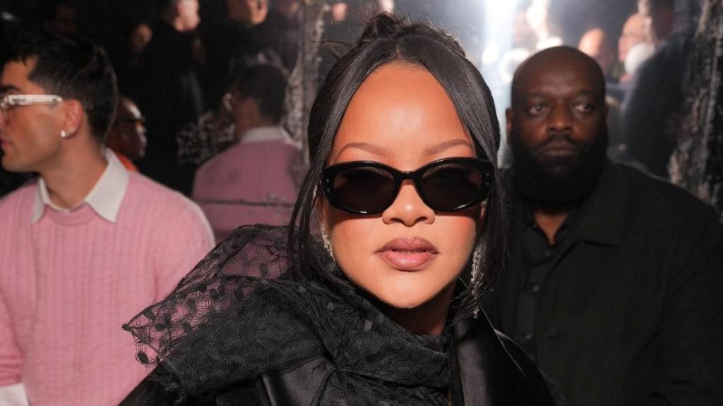 Rihanna Poses in Black Dress at Paris Couture Week