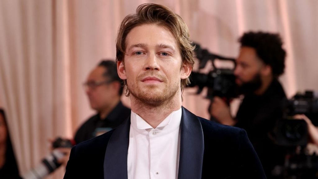 Joe Alwyn Suffers Wardrobe Malfunction As Costars Help Him