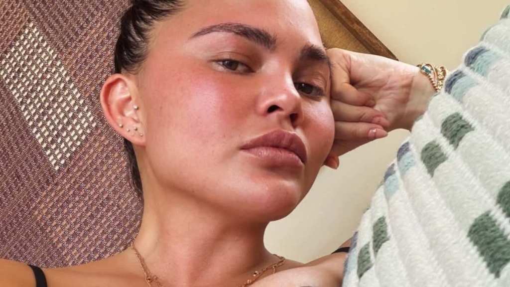 Chrissy Teigen Lying Down in Bra Will Make You Look Twice