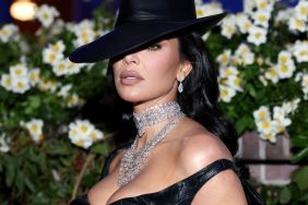 Kim Kardashian's Face Is Barely Visible in All-Black Aspen Look