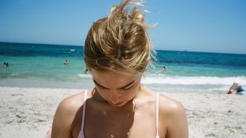 Addison Rae Proves She's Water Baby in Yellow Bikini