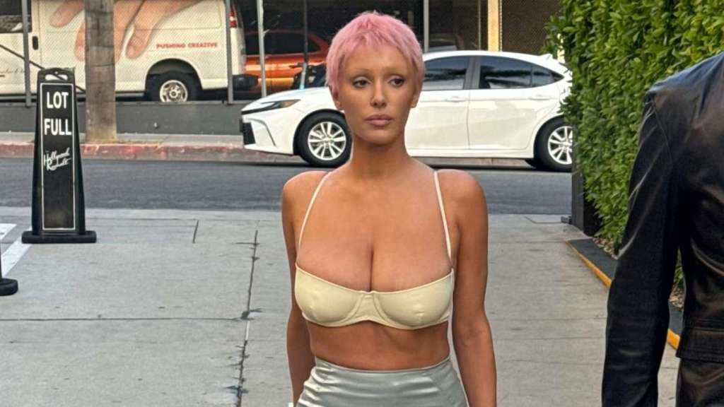 Kanye West’s Wife Goes Bold in Strappy Crop Top & Mini Skirt Combo