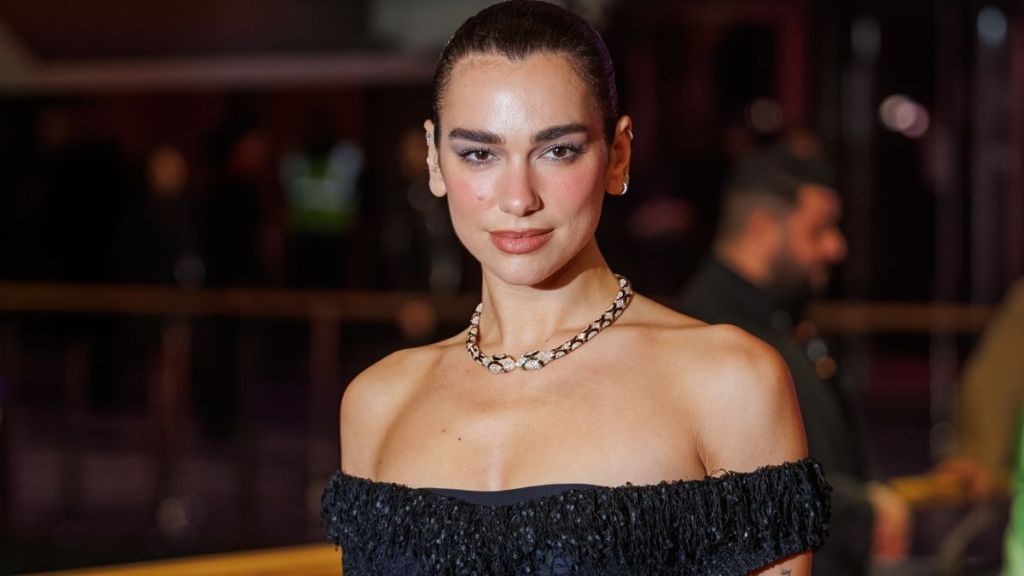 Dua Lipa Owns the Night in Sheer Lacy Look at Rosebush Pruning Premiere