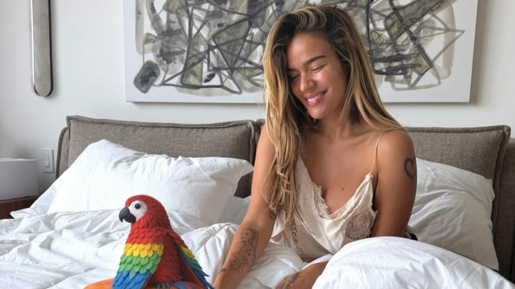 Karol G Makes a Statement in Risqué Lacy Top Following Grammy Buzz