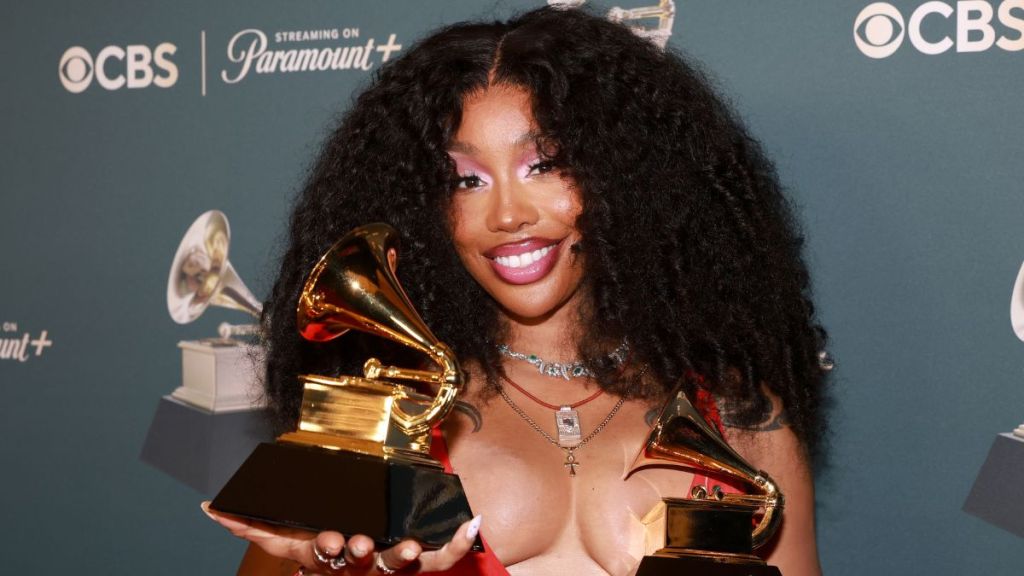SZA Makes Statement in Bold Red Dress at the Grammys