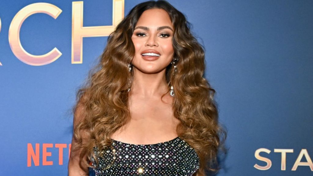 Chrissy Teigen's Bodysuit Look Gets a Sheer Spin for Netflix Show
