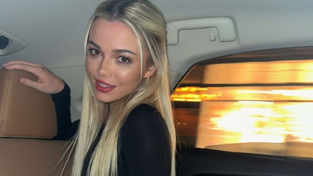 Livvy Dunne Lounges on a Sofa in a Cami Top After Joining Tom Brady’s Team