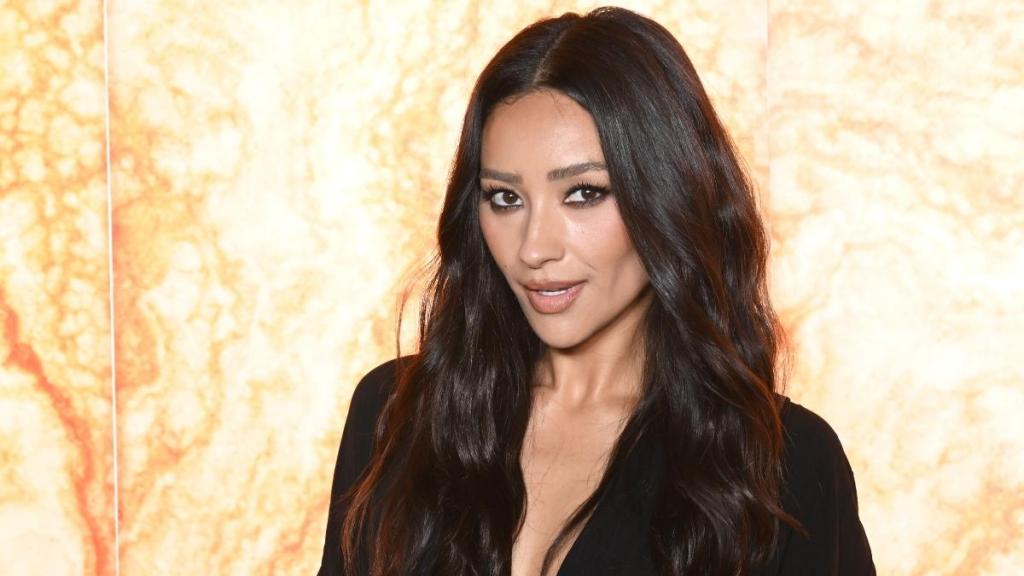 Shay Mitchell Brings a Risky Twist to a T-Shirt Dress Amid Baywatch Shoot