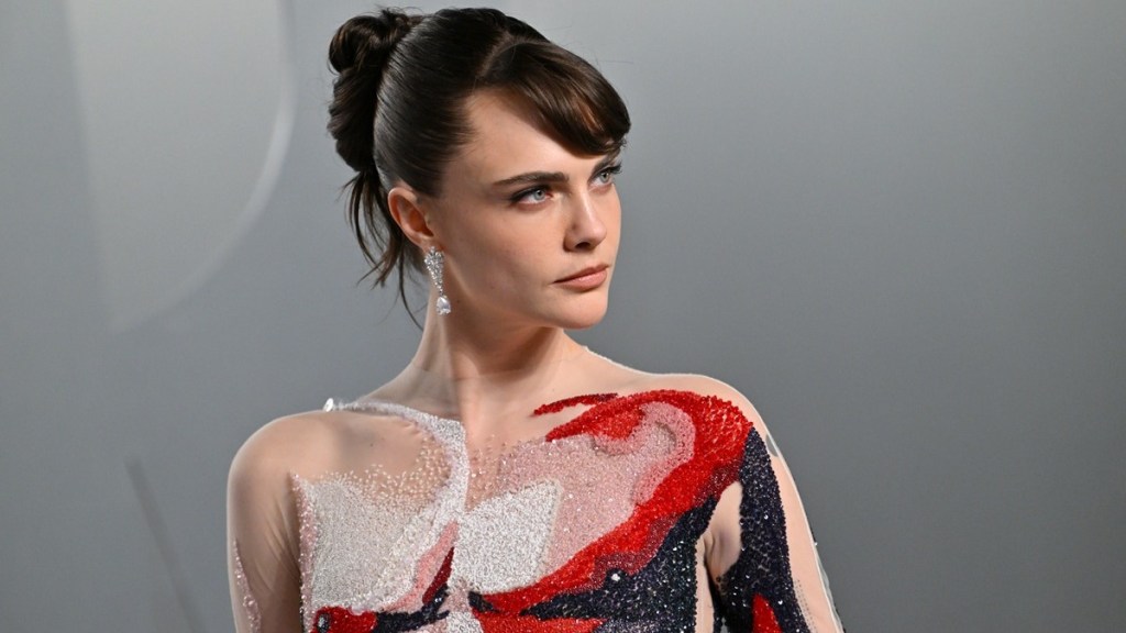 Cara Delevingne Brings a Sheer Illusion Moment to Oscar Party Carpet