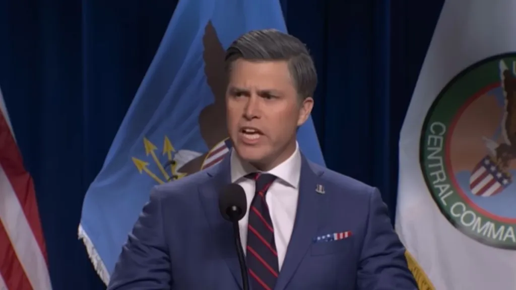 SNL’s Colin Jost Parodies Pete Hegseth, Secretary of War Avoiding the Word ‘War'