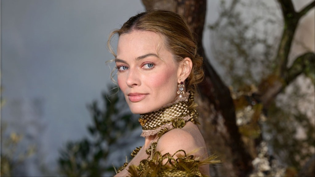 Margot Robbie's Poolside Swimsuit Look Is Jaw-Droppingly Bold for Chanel