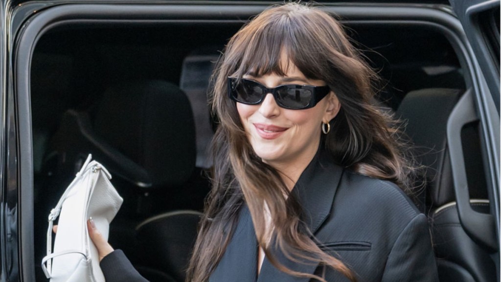 Dakota Johnson Slips Into Strap-Held Crop Top & Tights for Workout Session