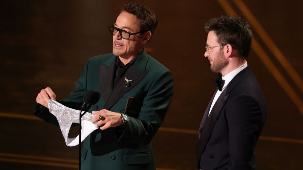 Avengers Reunite! Robert Downey Jr. Gifts Chris Evans Underwear at Oscars