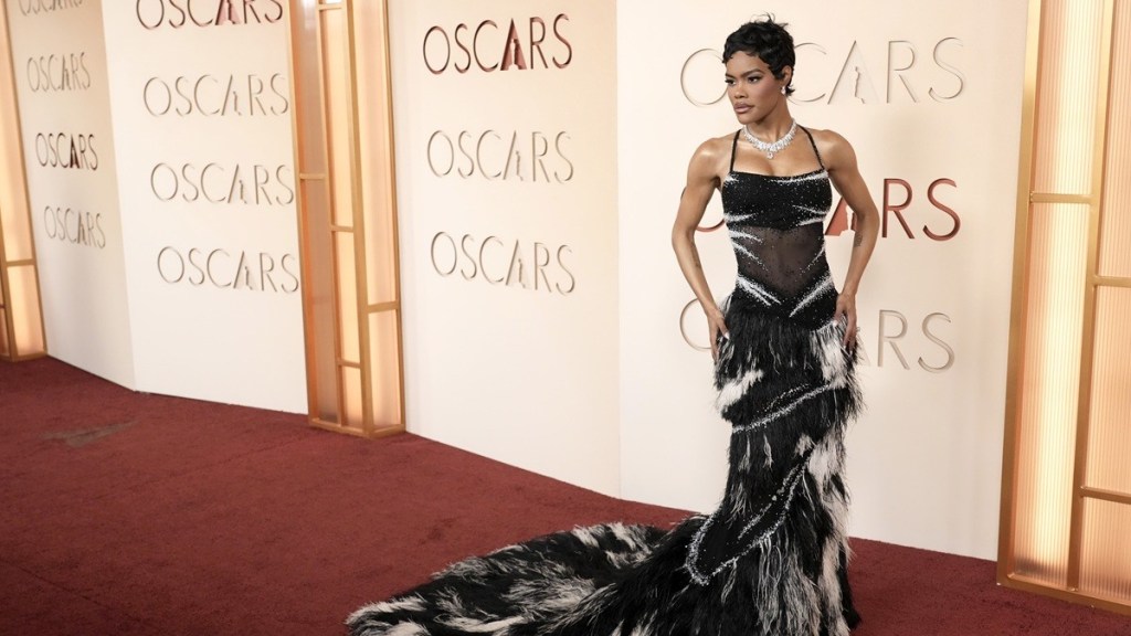 Teyana Taylor Stuns in Daring Thin-Strap Dress With Feather Details at Oscars Red Carpet