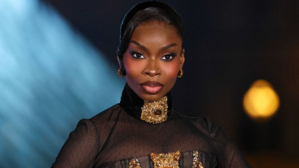 Olandria Carthen Stuns in Partly Sheer Gown With Playful Twist at Louvre