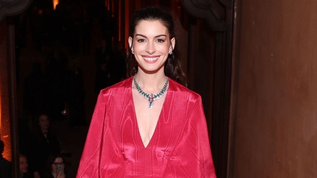 Anne Hathaway’s Bodysuit Has Way Too Many Cutouts in Film’s BTS Video