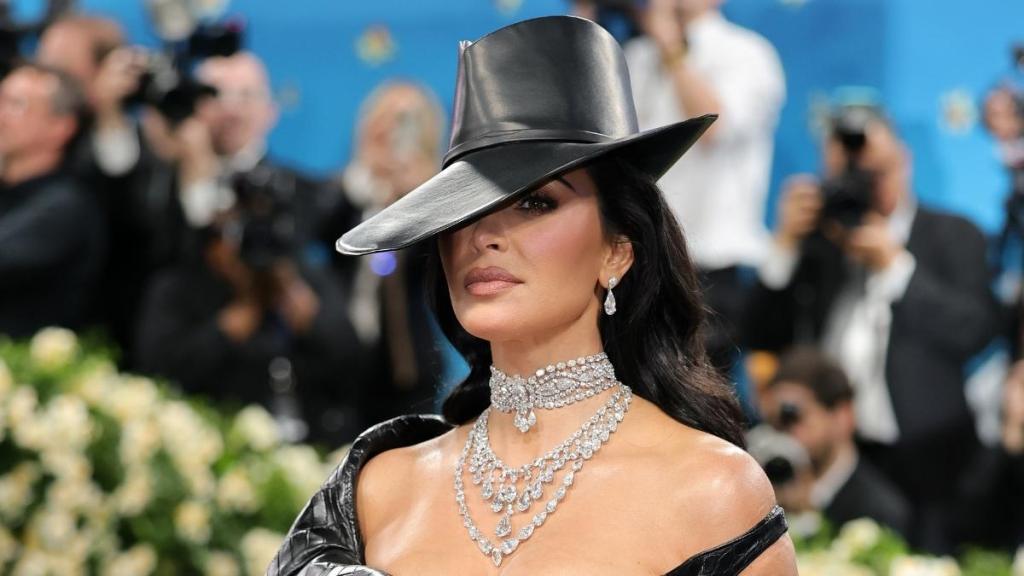 Kim Kardashian Channels Bold Showgirl in Bodysuit for Movie Shoot